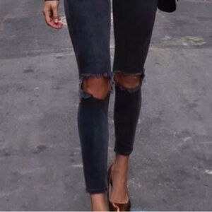 721 High rise skinny Black busted knee jeans